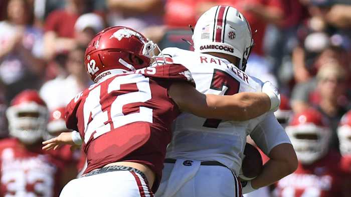 Arkansas linebacker Drew Sanders sacks South Carolina quarterback Spencer Rattler.
